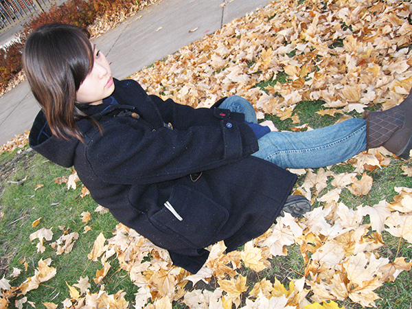 Peggy Wu gets into the fall sense of style as her black pea coat contrasts with the colorful leaves. (Photo by Priya Kailash / Student Voice) Peggy Wu gets into the fall sense of style as her black pea coat contrasts with the colorful leaves. (Photo by Priya Kailash / Student Voice)